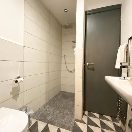 Apartamento At The Coach House