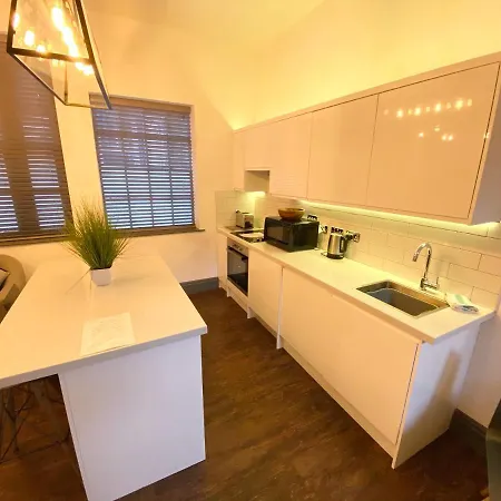 At The Coach House Apartamento